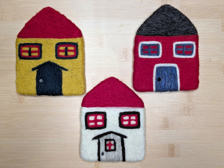 A felted set of coasters inspired by the historic houses of Trinity, NL.